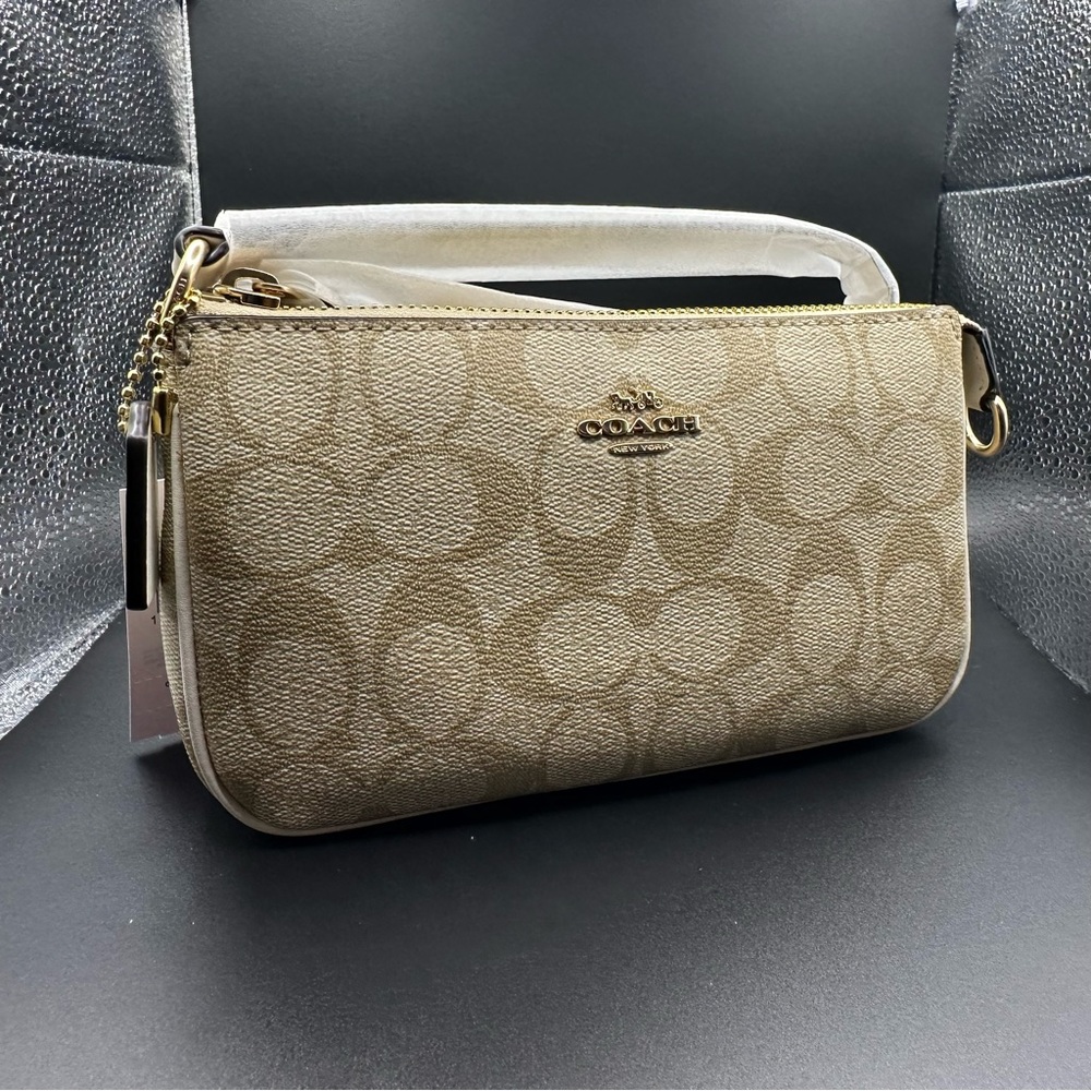 Coach Nolita 19 in Signature Canvas.